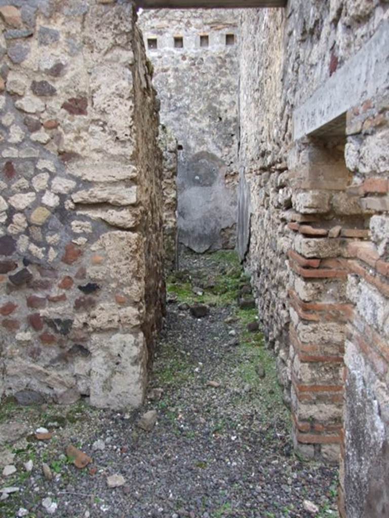 IX.5.2 Pompeii. December 2007. 
Corridor on south-east corner of peristyle ‘p’. leading to rooms ‘x’ and ‘y’, on left and ahead.
On the right is the small doorway into room ‘v’.