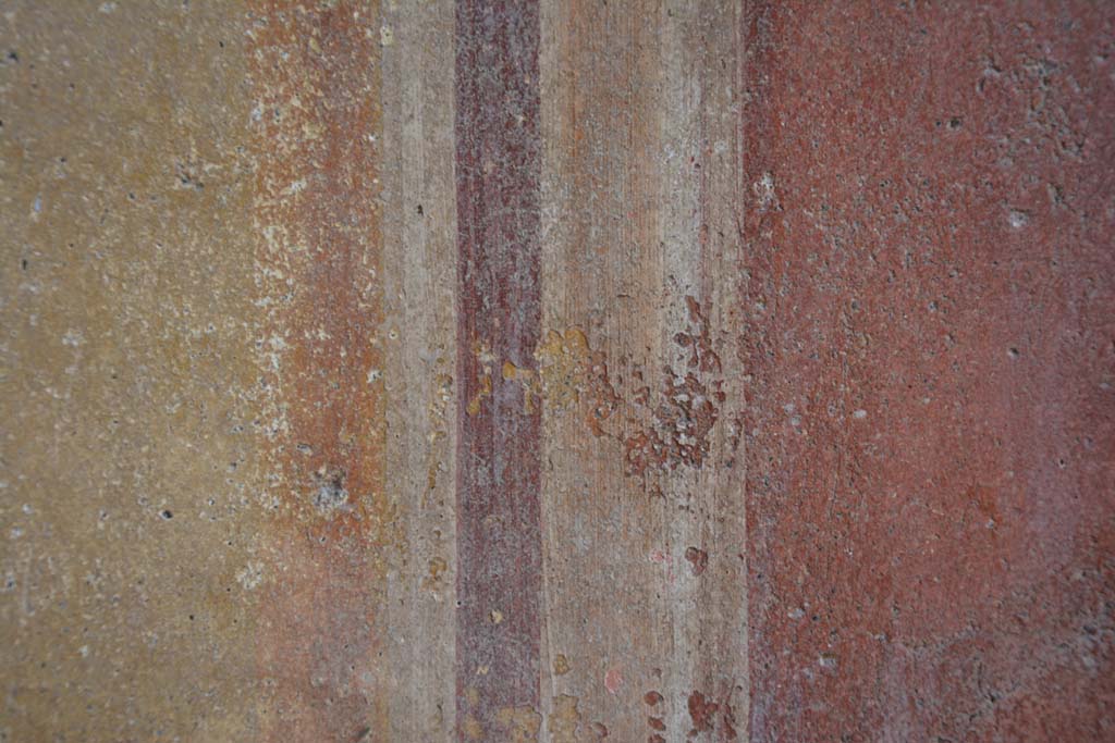 IX.5.2 Pompeii. May 2017. Room ‘u’, detail from east wall at north end, between yellow side panel and red central panel.
Foto Christian Beck, ERC Grant 681269 DÉCOR.