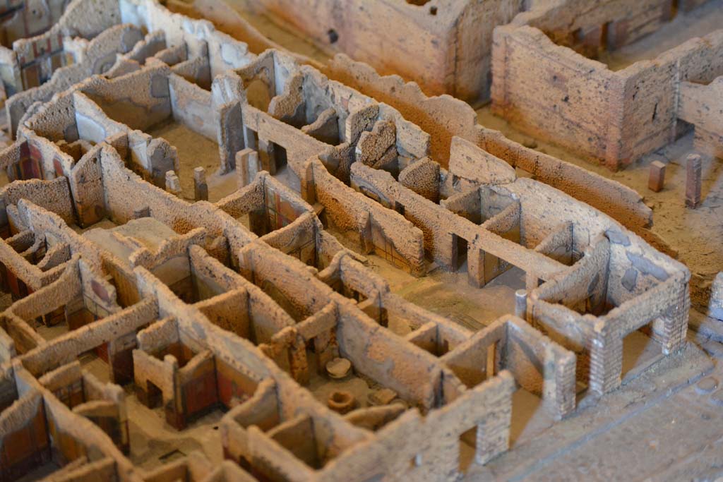 IX.5.4/3/2/1 Pompeii. July 2017. Detail of IX.5.2 in the north-west corner of insula, with Vicolo di Tesmo, and Central Baths, upper right.
From cork model in Naples Archaeological Museum.
Foto Annette Haug, ERC Grant 681269 DÉCOR