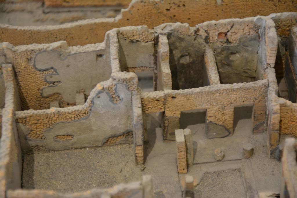 IX.5.2 Pompeii. July 2017. Side rear doorway at IX.5.22, in centre, with rooms in south-west corner around peristyle.
From cork model in Naples Archaeological Museum.
Foto Annette Haug, ERC Grant 681269 DÉCOR