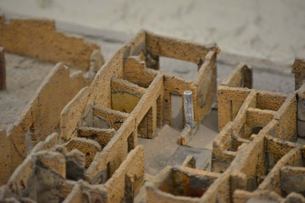 IX.5.1/2/3 Pompeii. July 2017. Looking north-west across atrium towards doorways from shops with entrance corridor, in centre.
From cork model in Naples Archaeological Museum.
Foto Annette Haug, ERC Grant 681269 DÉCOR