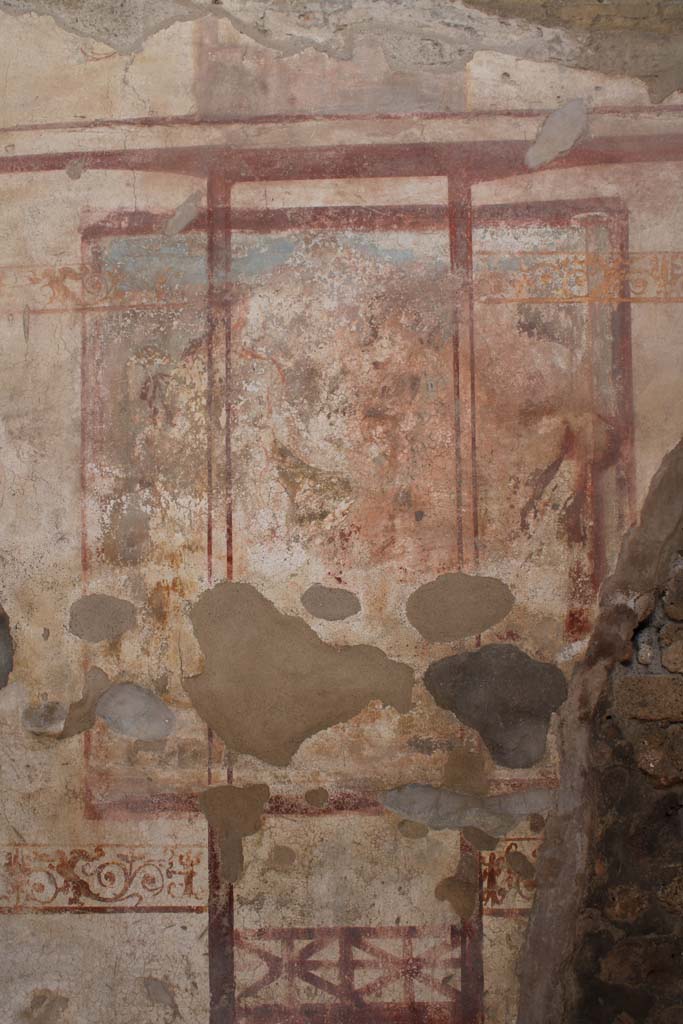 IX.5.2 Pompeii. May 2019. Room ‘c’, central wall painting on south wall.
Foto Christian Beck, ERC Grant 681269 DÉCOR.
According to Schefold, this was a painting of Ariadne, Dionysus and Silenus.  
See Schefold, K., 1962. Vergessenes Pompeji. Bern: Francke. (T. 173,1).
According to PPP, this wall painting may be of Hermaphrodite and a maenad.
See Bragantini, de Vos, Badoni, 1986. Pitture e Pavimenti di Pompei, Parte 3. Rome: ICCD. (p.451).