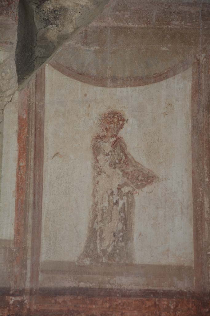 IX.5.6 Pompeii. May 2017. 
Room i, upper north wall in north-east corner, detail of figure in centre.   
Foto Christian Beck, ERC Grant 681269 DÉCOR.