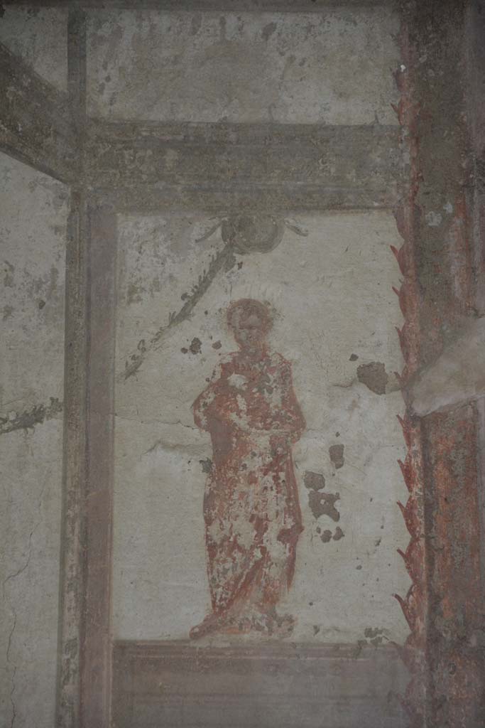IX.5.6 Pompeii. May 2017. 
Room i, detail of figure above dividing panel on upper east wall towards north end.     
Foto Christian Beck, ERC Grant 681269 DÉCOR.