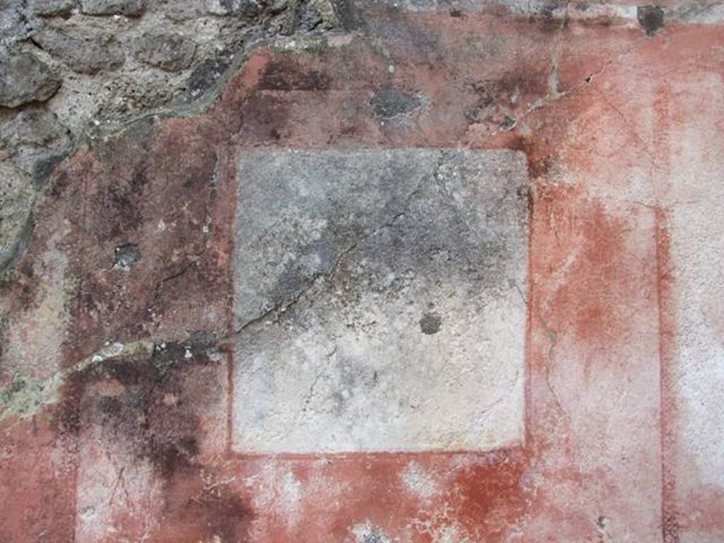 IX.5.6 Pompeii. December 2007. Room 5, remains of wall painting on south wall of ala on west side of atrium, 
According to Schefold this was a wall painting of a sitting girl and a young hunter with a lance, both crowned. 
See Schefold, K., 1957. Die Wande Pompejis. Berlin: De Gruyter. (p.253)
See Sogliano, A., 1879. Le pitture murali campane scoverte negli anni 1867-79. Napoli: (p. 127, no. 622)
