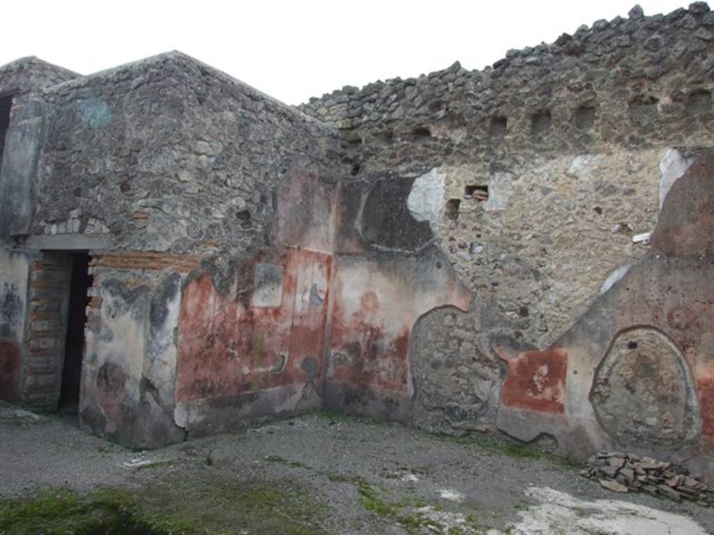 IX.5.6 Pompeii. December 2007. Looking south-west across atrium to doorway to room 6, (on left) which has not been photographed yet.
On the right is room 5, the western ala.
According to NdS, the zoccolo/dado of the walls in this room were violet, the middle zone of the walls of the cubiculum were painted in yellow, and were decorated with three paintings.
On the north wall was a painting of Silenus and a Baccante.
See Sogliano, A., 1879. Le pitture murali campane scoverte negli anni 1867-79. Napoli: Giannini. (p.42, no.180).
On the south wall was a painting of Hercules and a woman.
See Sogliano, A., 1879. Le pitture murali campane scoverte negli anni 1867-79. Napoli: Giannini. (p.82, no.497).
On the west wall was a painting of Pan discovering a Baccante.
See Sogliano, A., 1879. Le pitture murali campane scoverte negli anni 1867-79. Napoli: Giannini. (p.44, no.195).
See also Notizie degli Scavi, 1877, (p.332)
