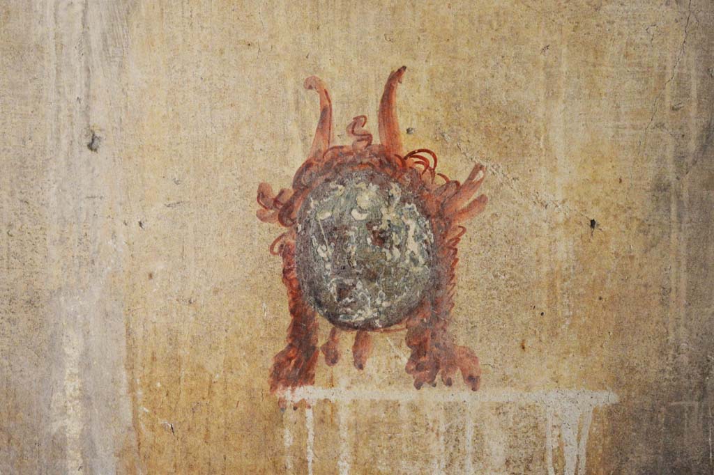 IX.5.6 Pompeii. May 2017. Room k’, painted mask from west wall at south end. 
Foto Christian Beck, ERC Grant 681269 DÉCOR.