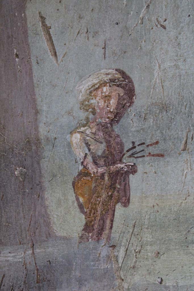 IX.5.9 Pompeii. May 2019. 
Room “l (L)”,  detail of one of the two figures on north wall at west end. 
Foto Christian Beck, ERC Grant 681269 DÉCOR.