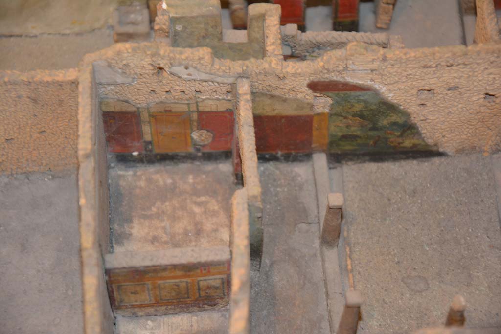 IX.5.9 Pompeii.  July 2017. Rooms in south-west corner of garden area, looking towards west walls.    
From cork model in Naples Archaeological Museum.
Foto Annette Haug, ERC Grant 681269 DÉCOR