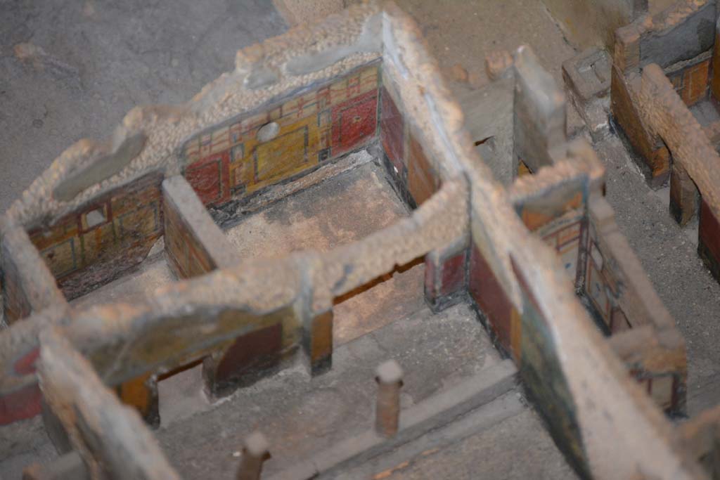 IX.5.9 Pompeii. July 2017. Detail of two rooms with decorated south walls on south side of peristyle garden.
On the right is a room from the rear of IX.5.6. 
From cork model in Naples Archaeological Museum.
Foto Annette Haug, ERC Grant 681269 DÉCOR