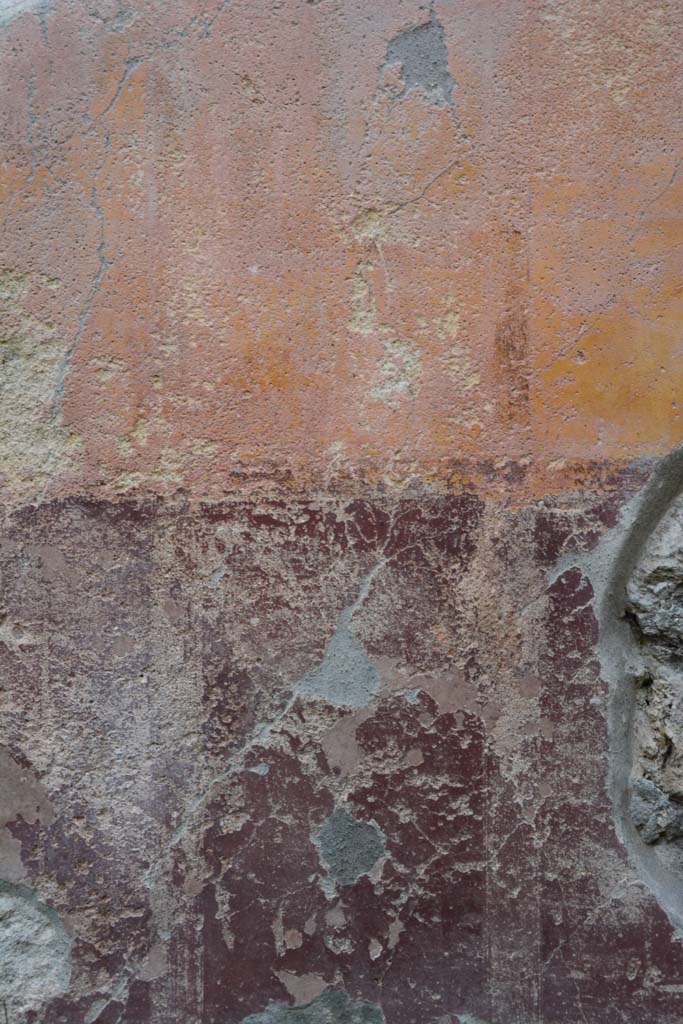IX.5.9 Pompeii. March 2017. Room “d”, detail from east end of south wall.
Foto Christian Beck, ERC Grant 681269 DÉCOR.
According to PPM – the red zoccolo had panels separated by compartments, the middle zone of the wall was yellow.
See Carratelli, G. P., 1990-2003. Pompei: Pitture e Mosaici. IX. (9). Roma: Istituto della enciclopedia italiana, (p.492).