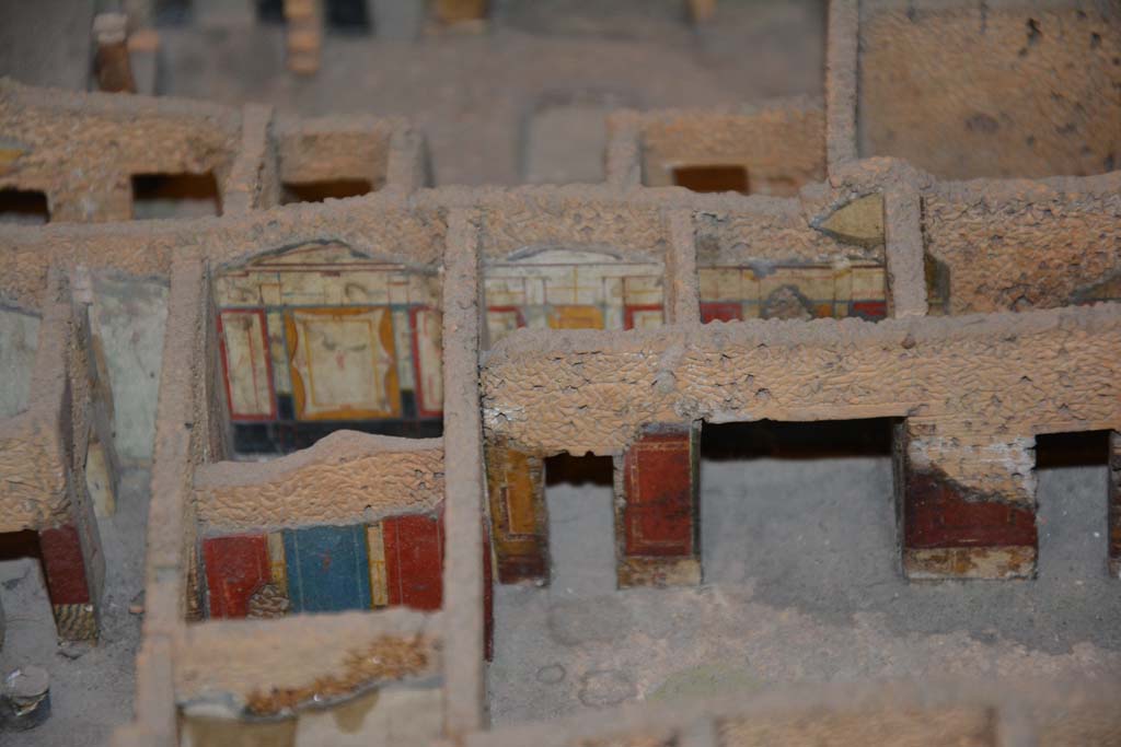 IX.5.11 Pompeii. July 2017. 
Looking west towards south-west corner of atrium, in centre, with tablinum with red and blue walls, on left.  
From cork model in Naples Archaeological Museum.
Foto Annette Haug, ERC Grant 681269 DÉCOR.