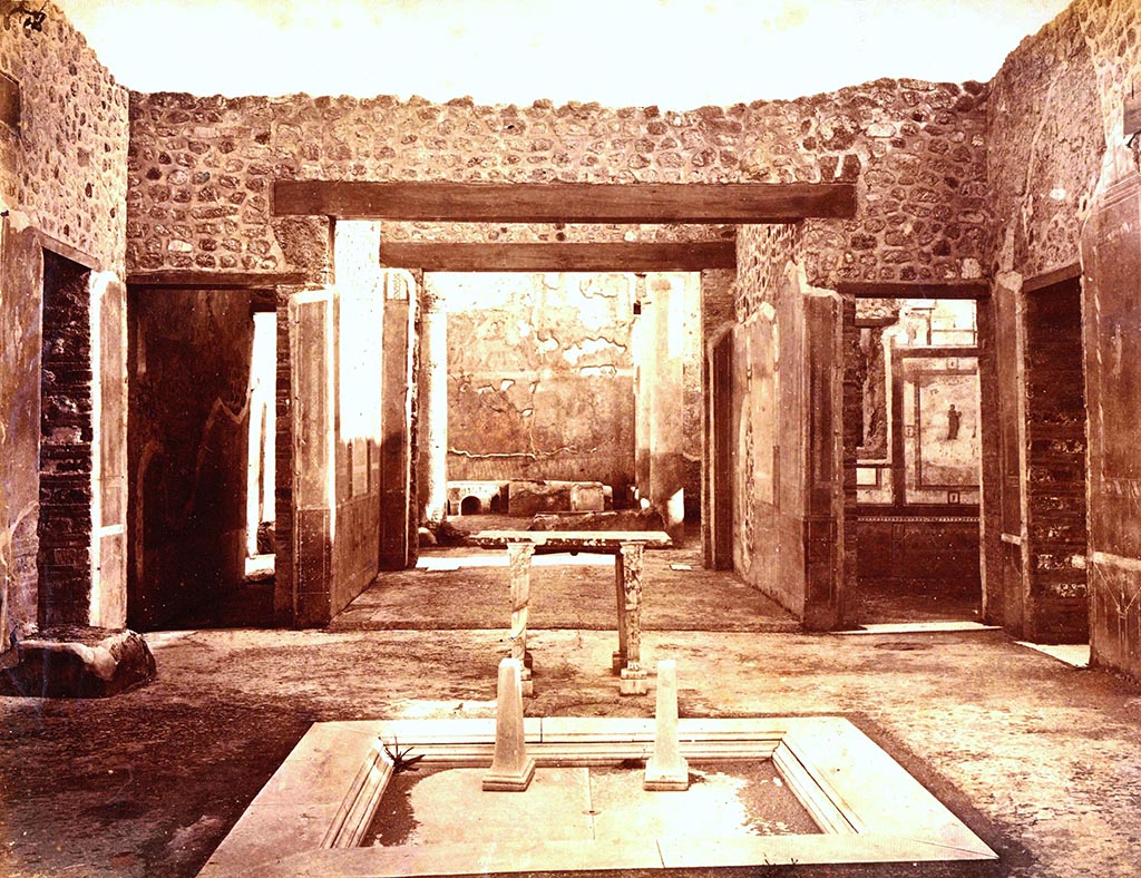 IX.5.11 Pompeii. Photo of atrium c. 1877-1880s? Looking south towards tablinum.
Photographer unknown. Labelled in error as “Casa di Bacco Scavi”.
Photo courtesy of Espen B. Andersson.