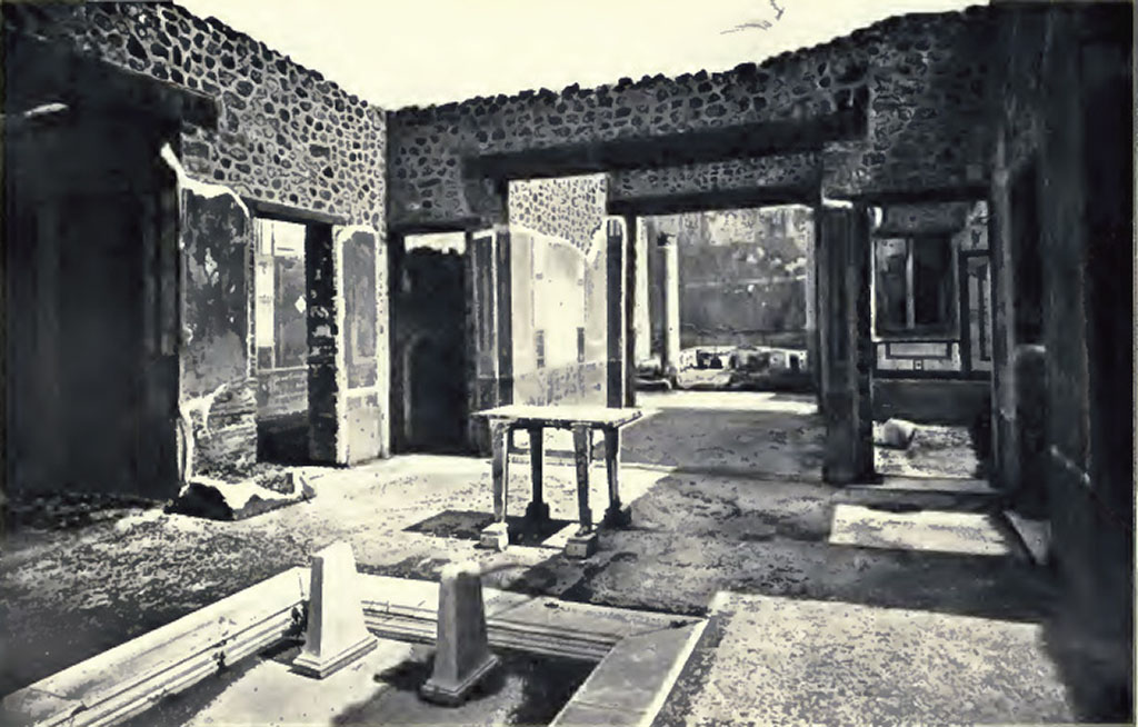 IX.5.11 Pompeii. C.1899. Atrium. Looking south-east across impluvium to tablinum.
According to Presuhn, on the left side of the atrium is the stone wall on which the remains of the bottom of an iron chest were found. 
In this was found a gold ring. Above this was found a painting of Summer.
On the opposite side of the atrium was a painting of Spring.
The paintings of Autumn or Winter had disappeared. 
See Presuhn E., 1882. Pompeji: Die Neuesten Ausgrabungen von 1874 bis 1881. Leipzig: Weigel. (VIII).