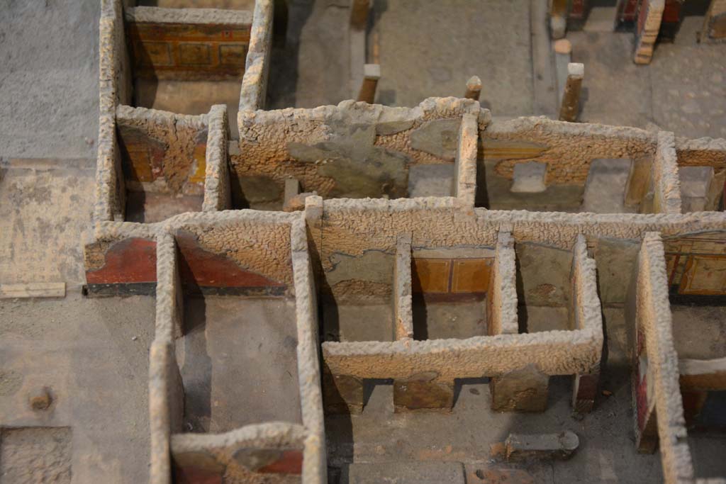 IX.5.14 Pompeii. July 2017. On the lower left is room f, triclinium in north-west corner of atrium.
In the upper left is the peristyle k, with cubiculum l (L) on its north side.
Above that are rooms from IX.5.9 on the rear side of the peristyle area. 
On the lower right are rooms on the west side of the garden triclinium of IX.5.11.
From cork model in Naples Archaeological Museum.
Foto Annette Haug, ERC Grant 681269 DÉCOR