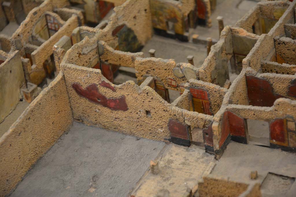 IX.5.14 Pompeii. July 2017. Looking towards north-west corner and north wall of peristyle k, and doorway into cubiculum l (L), in centre.
From cork model in Naples Archaeological Museum.
Foto Annette Haug, ERC Grant 681269 DÉCOR