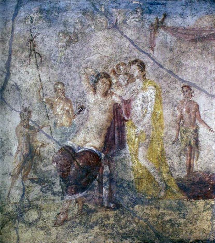 IX.5.14 Pompeii. Room “f”, centre of east wall of triclinium. Painting of Dionysus and Ariadne.
Now in Naples Archaeological Museum. Inventory number 111481. 
Kuivalainen comments: This composition may be an alternative artistic interpretation of Bacchus and Ariadne after having reached an understanding. The cupid is indeed sometimes depicted with Ariadne, not only with Venus. Ariadne’s yellow robe can refer to her bridal status.
See Kuivalainen, I., 2021. The Portrayal of Pompeian Bacchus. Commentationes Humanarum Litterarum 140. Helsinki: Finnish Society of Sciences and Letters, (p.132, D12).
