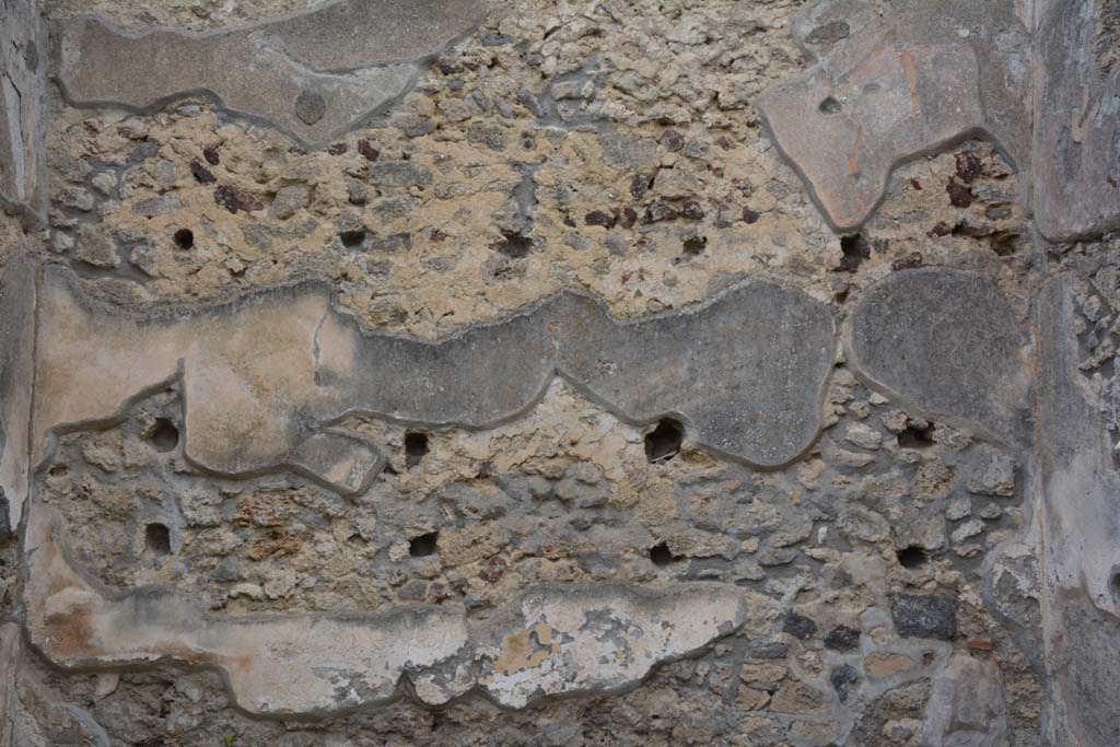 IX.5.14 Pompeii. May 2017. North ala “e”, detail from north wall, with holes for supports for shelving.
Foto Christian Beck, ERC Grant 681269 DÉCOR.