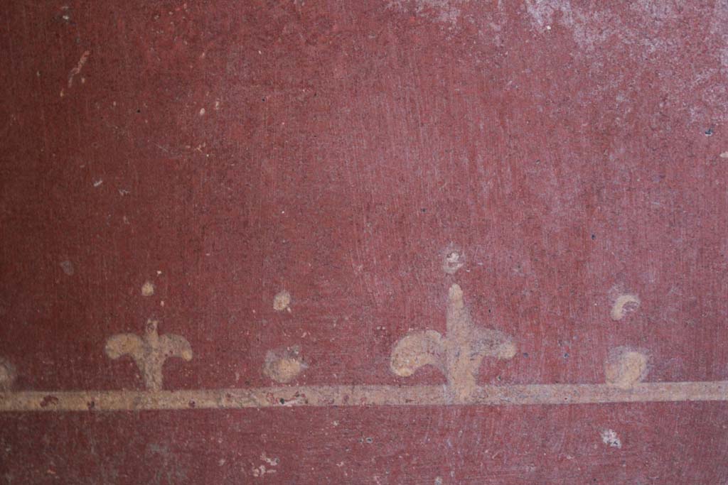 IX.5.16 Pompeii. May 2019. Room “g”, detail of painted border around base of panel at west end of north wall.
Foto Christian Beck, ERC Grant 681269 DÉCOR.