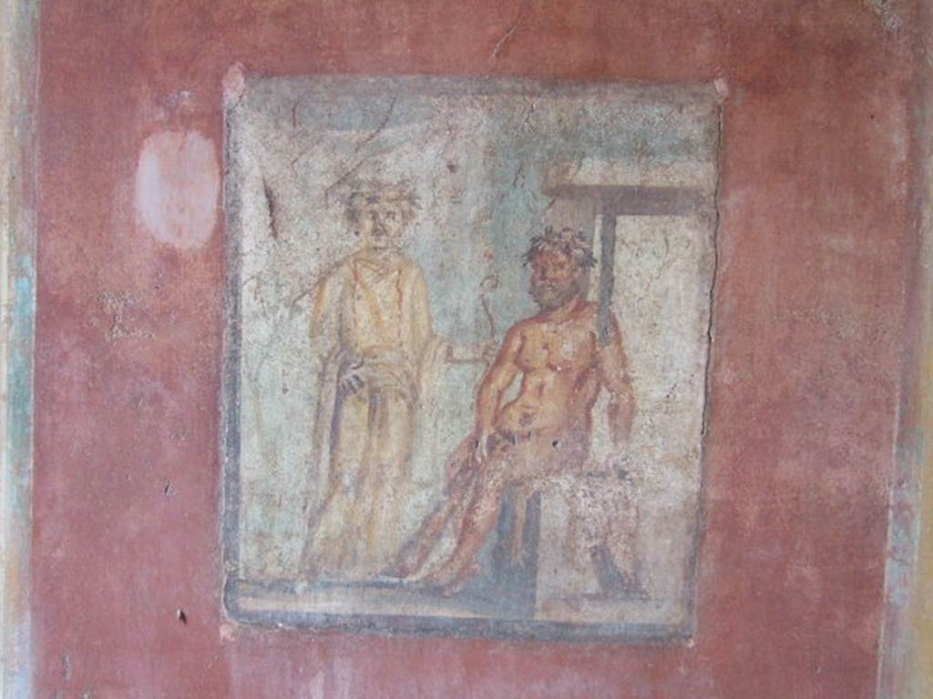 IX.5.14 Pompeii. May 2005. Cubiculum “g”, on south side of entrance doorway.
Wall painting of Hercules and Omphale, found on north wall.
See Bragantini, de Vos, Badoni, 1986. Pitture e Pavimenti di Pompei, Parte 3. Rome: ICCD. (p.483)
See Sogliano, A., 1879. Le pitture murali campane scoverte negli anni 1867-79. Napoli: (p.82, no.496)