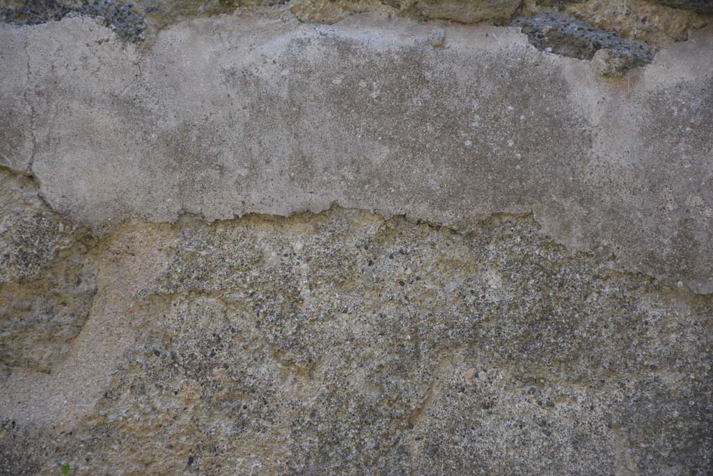 IX.5.17/6 Pompeii. May 2017. Room x, detail of remaining plaster on lower west wall.
Foto Christian Beck, ERC Grant 681269 DÉCOR.