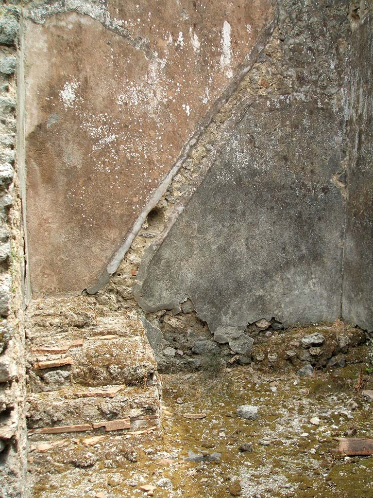 IX.5.17 Pompeii. May 2005. 
Looking east towards stairs to upper floor in room in stable, possibly housing for a groom.