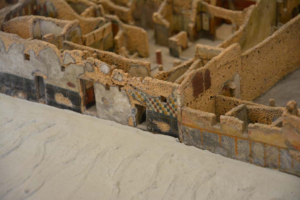IX.5.18, Pompeii. 2017. Detail from model in Naples Archaeological Museum.
Looking north to doorways in unnamed vicolo between IX.5 and IX.6, with IX.5.18 and IX.5.19, on left.
Foto Taylor Lauritsen, ERC Grant 681269 DÉCOR.