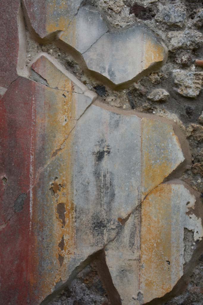 IX.5.18 Pompeii. March 2017. 
Room o, painted decoration (probably a candelabra) on west wall at south end.
Foto Christian Beck, ERC Grant 681269 DÉCOR.