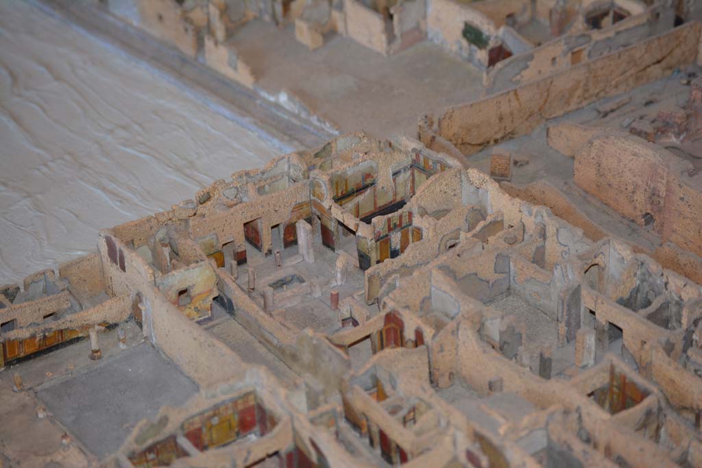 IX.5.16, on left, IX.5.17, centre left, and IX.5.18, Pompeii. July 2017. Detail from south side of insula. Looking south-west.
From cork model in Naples Archaeological Museum.
Foto Annette Haug, ERC Grant 681269 DÉCOR