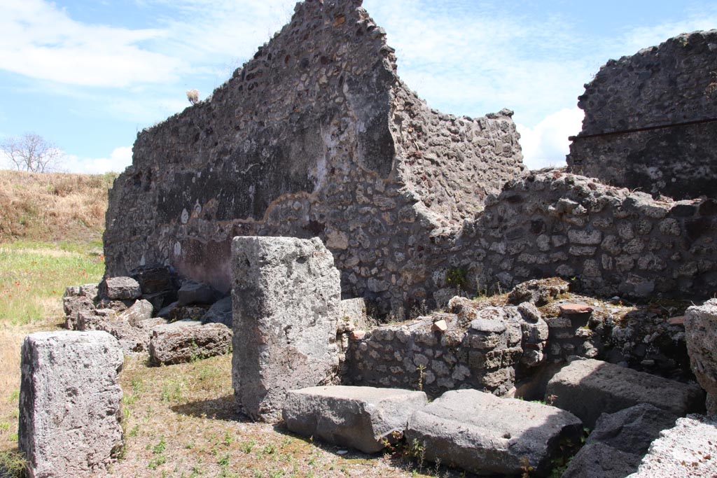 IX.6.4 Pompeii. May 2024. 
Looking east along south wall from area of room in south-west corner, with stairs to upper floor on its east side. Photo courtesy of Klaus Heese.