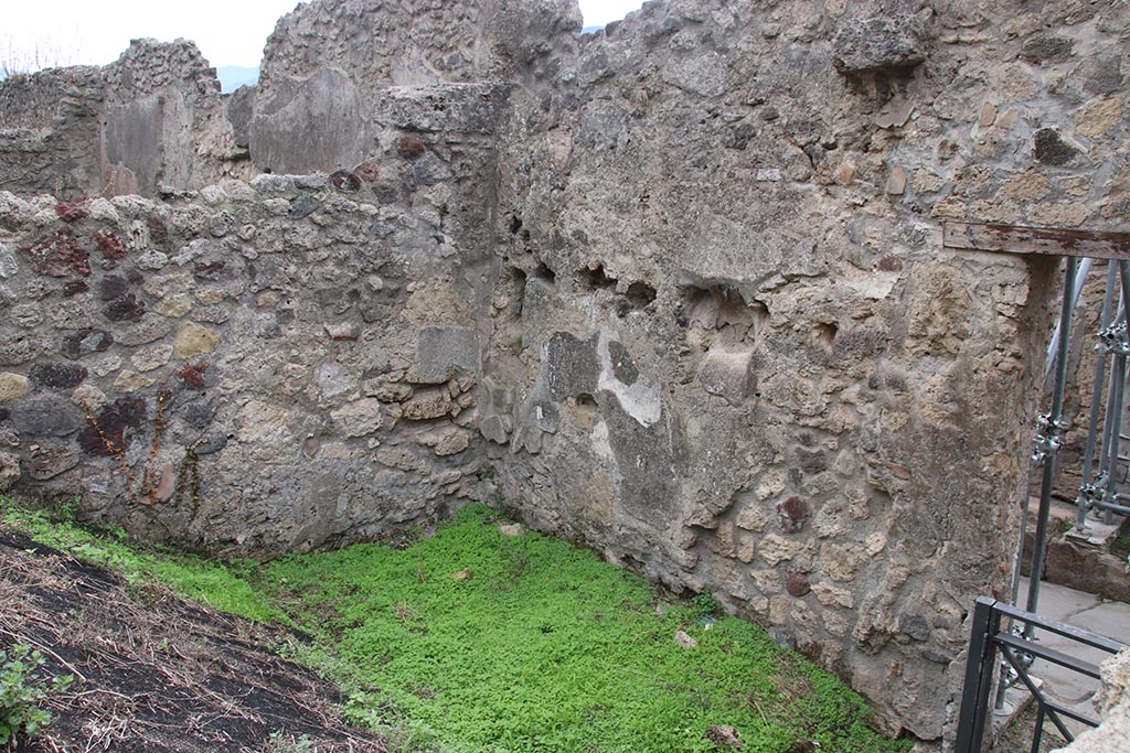 IX.7.14 Pompeii. October 2024. Looking south-west, with interior of doorway IX.7.14 on right. 
In the upper left of the photo are rooms belonging to IX.12.12. Photo courtesy of Klaus Heese.