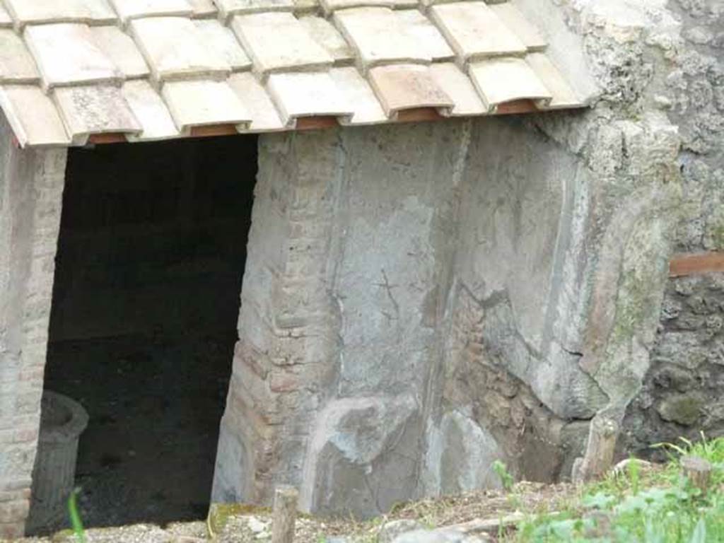 IX.7.16 Pompeii. May 2010. Cubiculum on north side of entrance. 
Jashemski says that this room, according to Mau, had a garden scene in the centre of the side panels on each wall, other than on the north, which had been painted later. 
Mau did not describe the paintings, and they are no longer visible. 
See Mau, BdI, 1883, (p.126-133)
See Jashemski, W. F., 1993. The Gardens of Pompeii, Volume II: Appendices. New York: Caratzas. (p.401)
According to Dawson, -
• On the entrance (east) wall, right of doorway was - Perseus & Andromeda, p. 84, pl. IV.
• On the left (south) wall was - Rape of Hylas, p. 85, pl. III.
• On the rear (west) wall was - Trojan Horse, p. 85, pl. IV.
• On the right (north) wall was – a sacred landscape, p. 86.
See Dawson, C. 1944. Romano-Campanian Mythological Landscape Painting. 
See Schefold, K., 1962. Vergessenes Pompeji. Bern: Francke. (Fig.11, 2).
See Catalogue, 1989. Italienische Reise: Pompejanische Bilder in den deutschen archaeologischen Sammlungen. Napoli: Bibliopolis. p. 241-244, fig 81. 
See Peters, W.J.T. (1963): Landscape in Romano-Campanian Mural Paintings. The Netherland, Van Gorcum & Comp. (p. 77-78, figs. 61, 62 & 63)