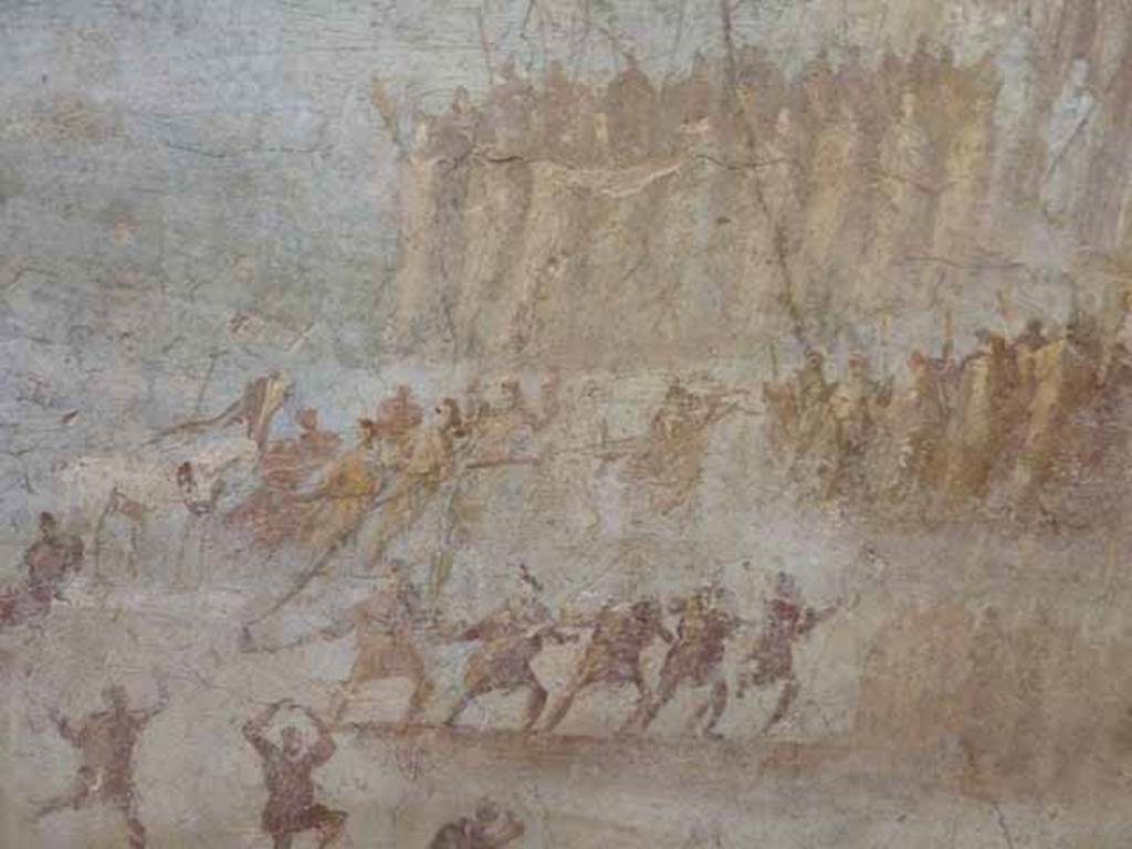 IX.7.16 Pompeii. Found on west wall of cubiculum on north side of entrance. Detail of painting of the Trojan Horse.  The Trojans drag the wooden horse to the walls of Troy.