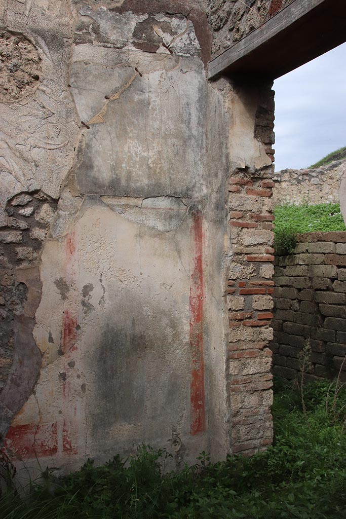 IX.7.16 Pompeii. October 2024. 
Room “b”, detail of north wall at east end, with doorway into atrium. Photo courtesy of Klaus Heese.