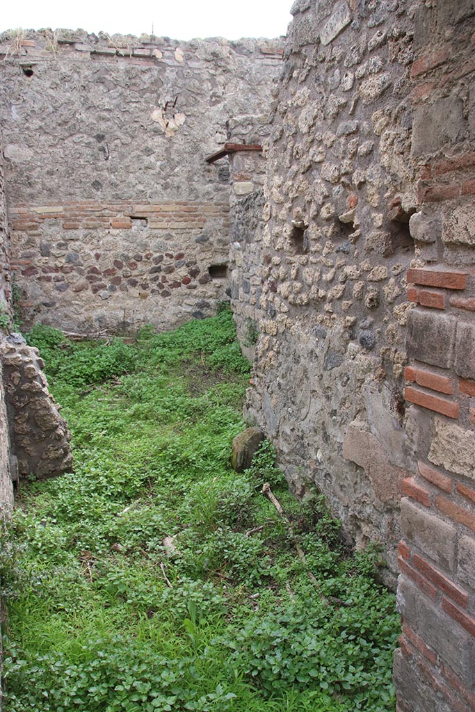 IX.7.16 Pompeii. October 2024. 
Looking south-west from doorway into room 3, and through into room “d”. Photo courtesy of Klaus Heese.