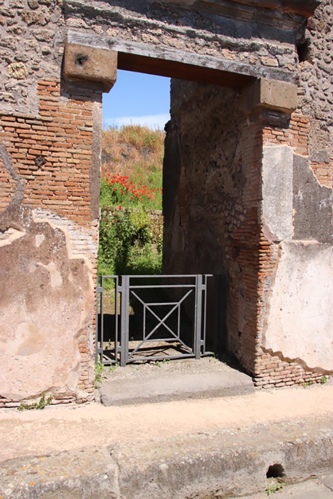 IX.7.16 Pompeii. May 2024. 
Looking towards south side of entrance doorway. Photo courtesy of Klaus Heese.