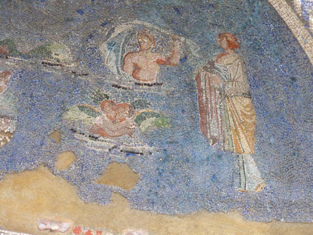 IX.7.20 Pompeii. December 2007. Mosaic fountain. Detail from arched top. 
Bathing scene with cherubs or cupids and male figure bathing and female figure holding robes.