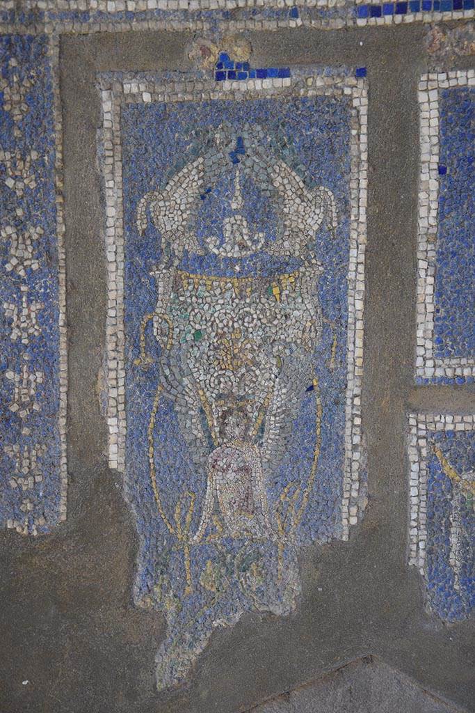 IX.7.20 Pompeii. October 2017.  
Mosaic fountain, detail of female figure on south side panel. Photo courtesy of Johannes Eber.