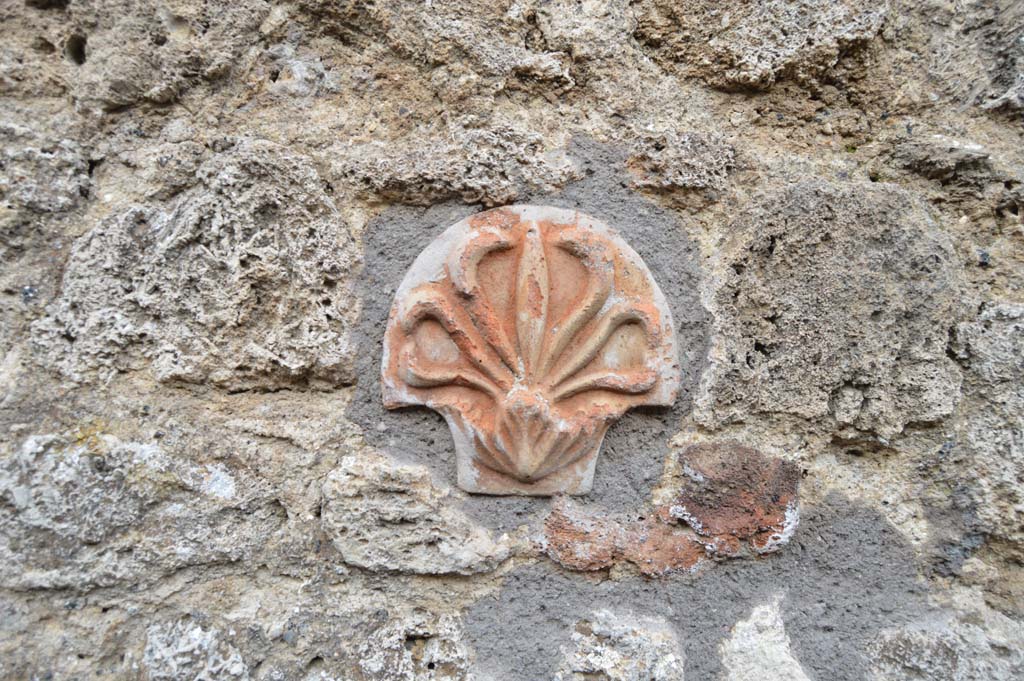 IX.7.21 Pompeii. March 2018. 
Looking east towards terracotta decoration embedded in masonry.
Foto Taylor Lauritsen, ERC Grant 681269 DÉCOR.
