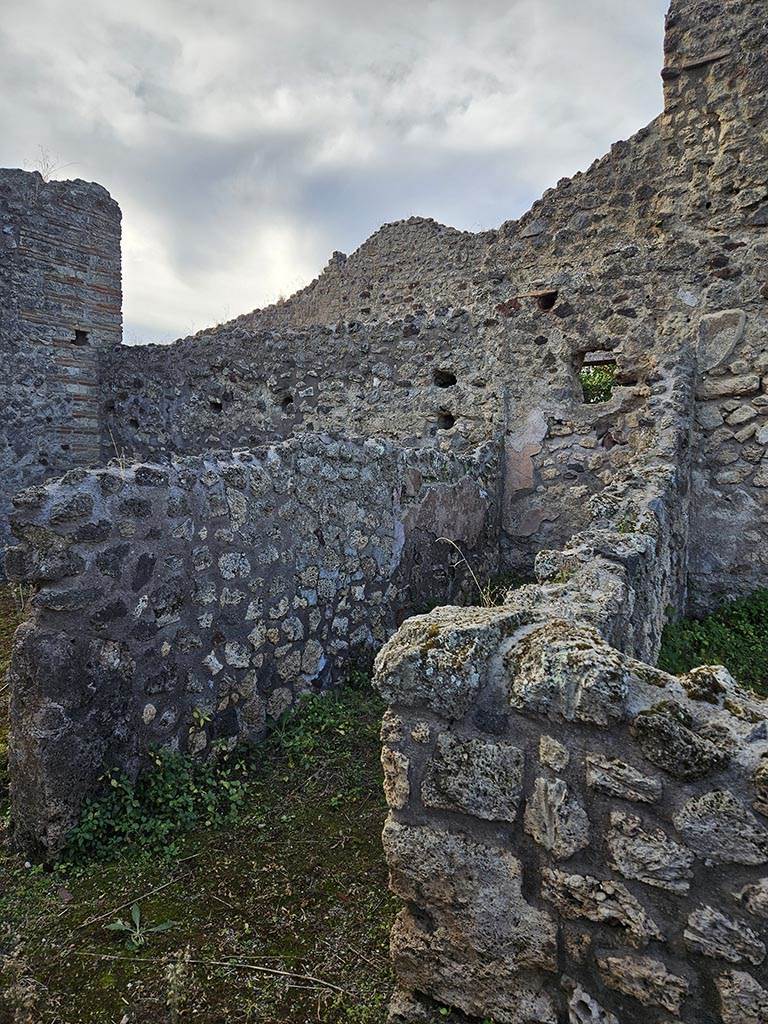 IX.7.21 Pompeii. November 2024. 
Looking towards south wall of corridor to latrine. Photo courtesy of Annette Haug.