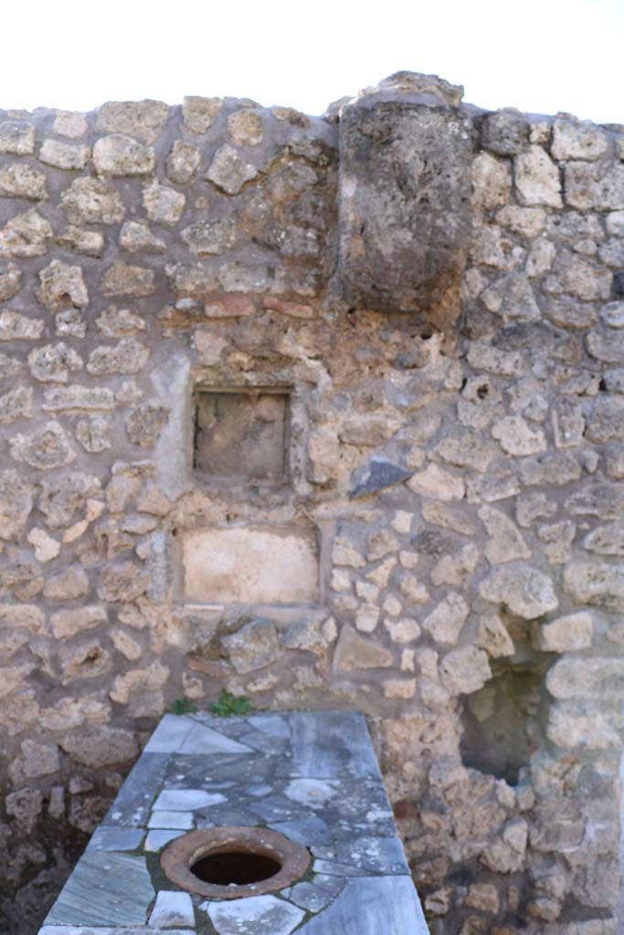 IX.7.24 Pompeii. December 2018. 
Looking towards west wall with square niches. Photo courtesy of Aude Durand.