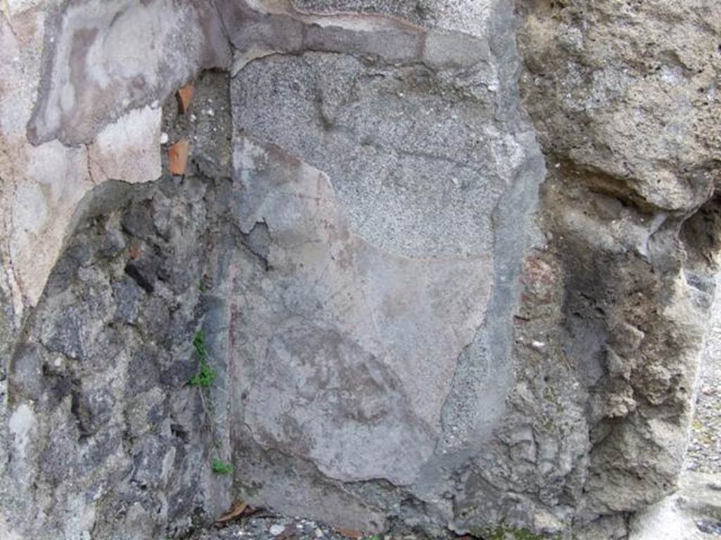 IX.8.2 Pompeii.  March 2009. North west corner of base of walls of front room of shop.