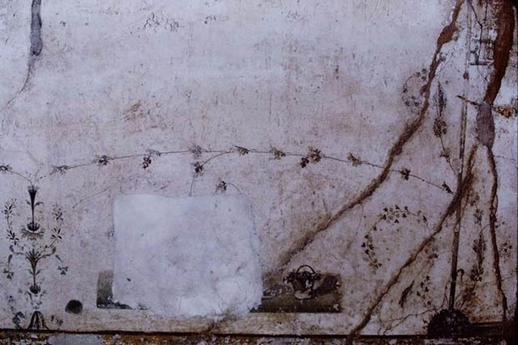 X.8.6 Pompeii, 1968.  Detail from east side of the centre of the north wall with remains of panel with painting of pygmies gathering  the grapes. Photo by Stanley A. Jashemski.
Source: The Wilhelmina and Stanley A. Jashemski archive in the University of Maryland Library, Special Collections (See collection page) and made available under the Creative Commons Attribution-Non Commercial License v.4. See Licence and use details. J68f1553