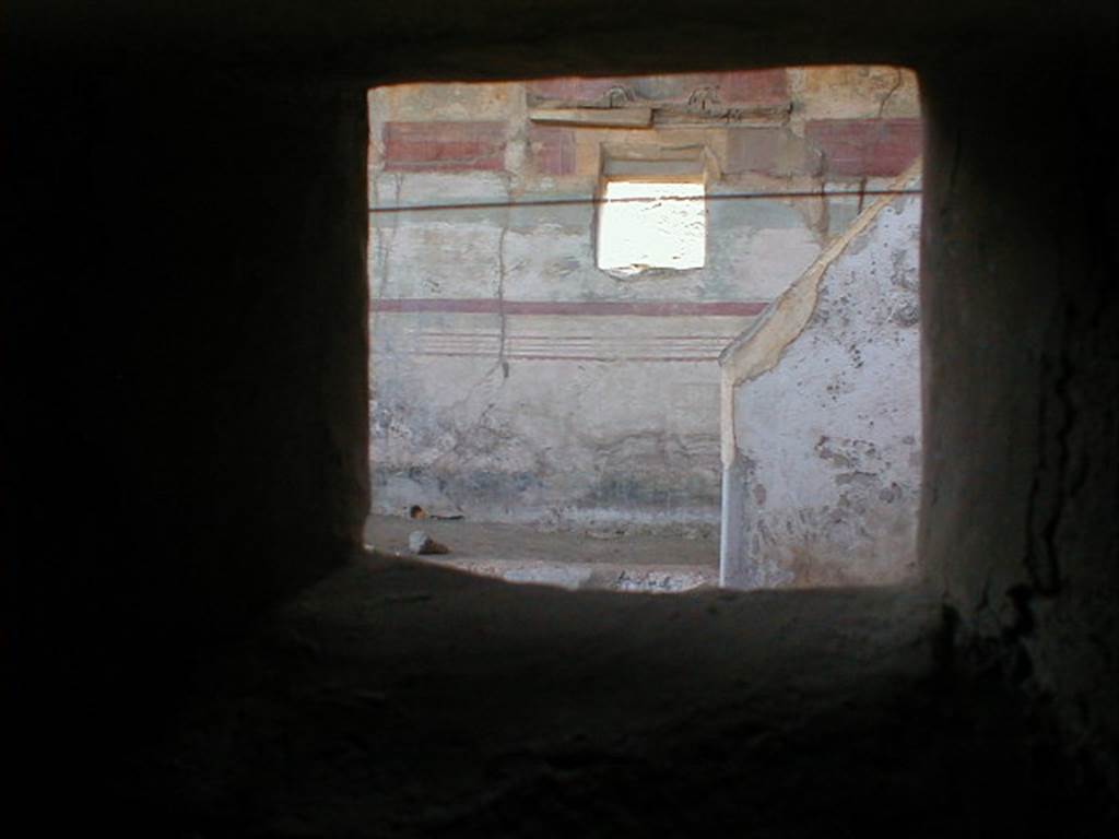 IX.8.6 Pompeii.  September 2004.  Room 18, Looking into Nymphaeum through duct in service corridor.