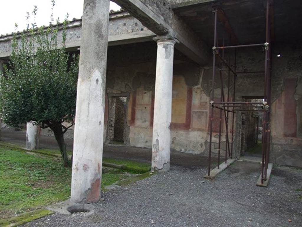 IX.8.6 Pompeii.  December 2007.  North west corner of peristyle and Room 34, Corridor, leading to rooms on north west side of house.