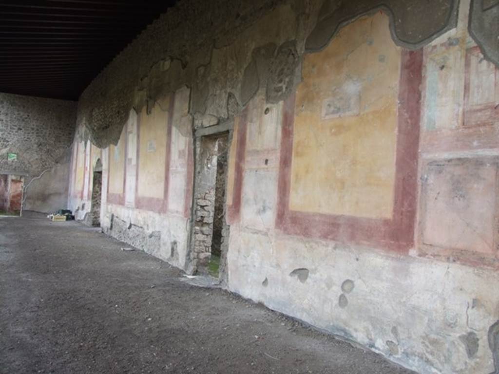 IX.8.6 Pompeii. December 2007. West portico, looking south. Schefold describes six large panels separated by seven views which are framed. These framed views are of wind gods shown with winged heads. They are listed as (from south to north) Boreas, Oceanus, Zephyr, then two gaps, Apeliotes, Euros or Notos, See Schefold, K., 1957. Die Wände Pompejis. Berlin: De Gruyter.  (p. 276).