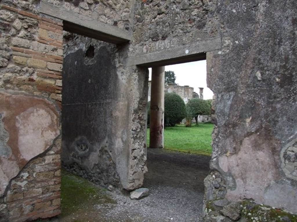IX.8.6 Pompeii. March 2009.   Doorway to Room 30 Corridor leading north.  
Looking east through doorway to West Portico