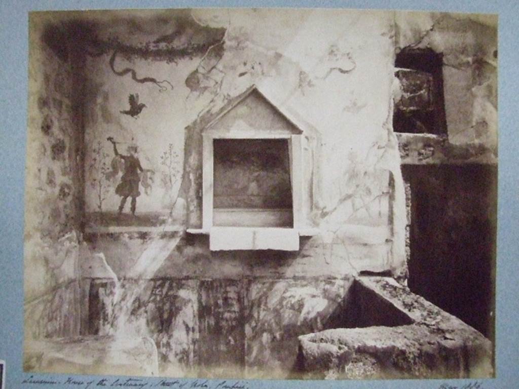 IX.8.a Pompeii. May 1886 photograph. Lararium in kitchen area of House of the Centenary.  
Photo courtesy of Society of Antiquaries. Fox Collection.