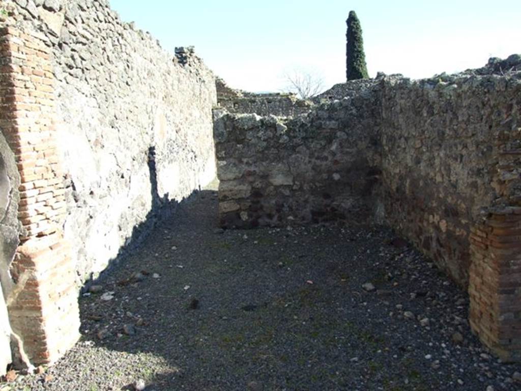 IX.9.2 Pompeii. March 2009. Doorway to room “e” on south-east side of atrium, instead of a tablinum. This room would have had opus signinum flooring but this was lacking. This room appeared to have been used as a passageway from the atrium to the peristyle, with which it joined. For rooms at the rear surrounding the peristyle, see IX.9.a.