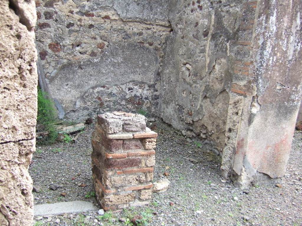 IX.9.4 Pompeii. May 2006. Doorway to small room on east side of atrium, with steps to upper floor.